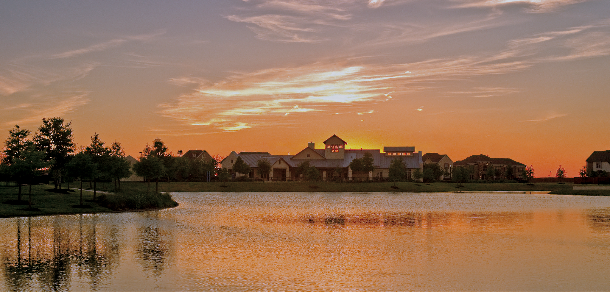 Neighborhood at sunset by the lake — places to live